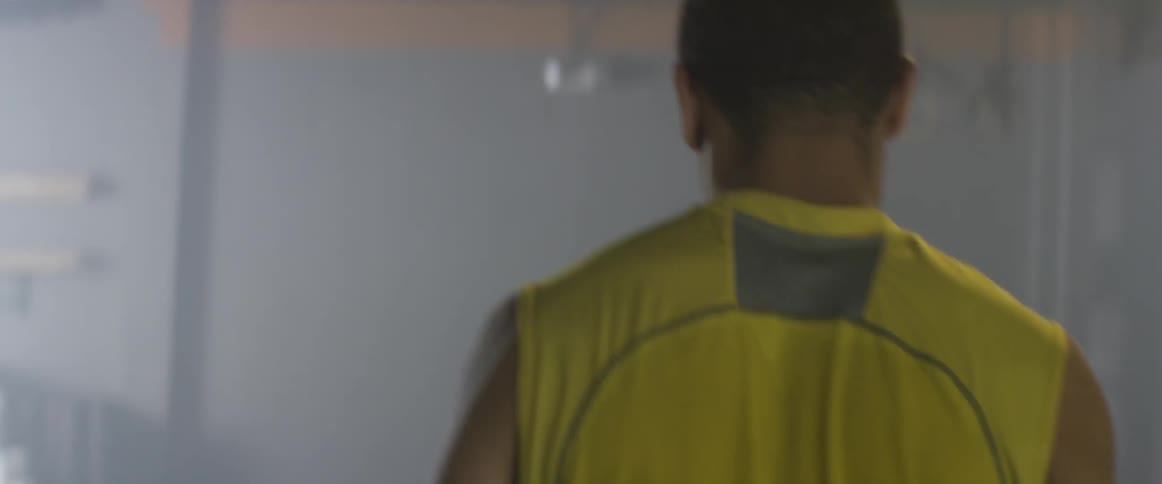 A man walking indoors