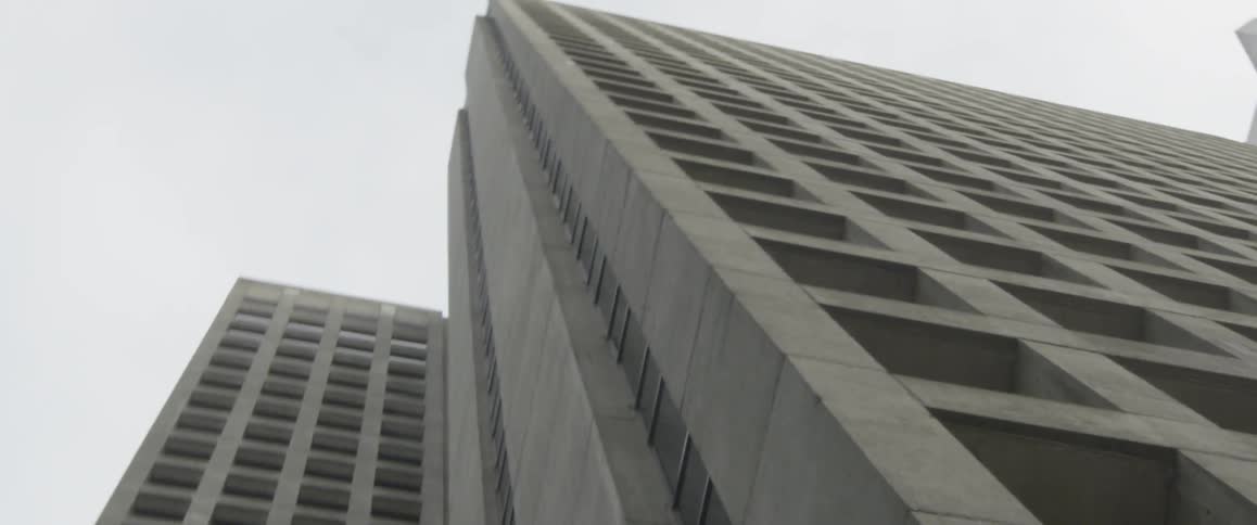 The camera scales the sky scraper rapidly
