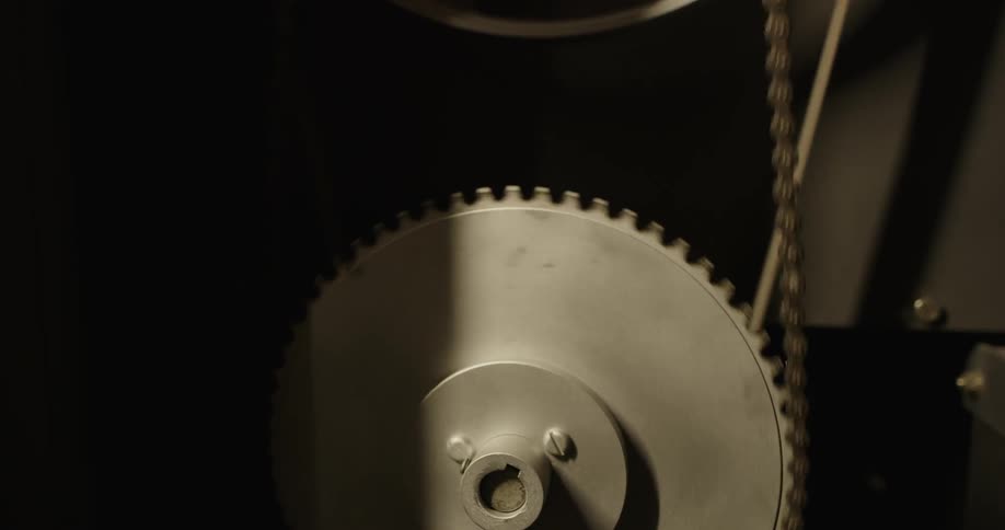 Two chains are turning smoothly on an industrial unit