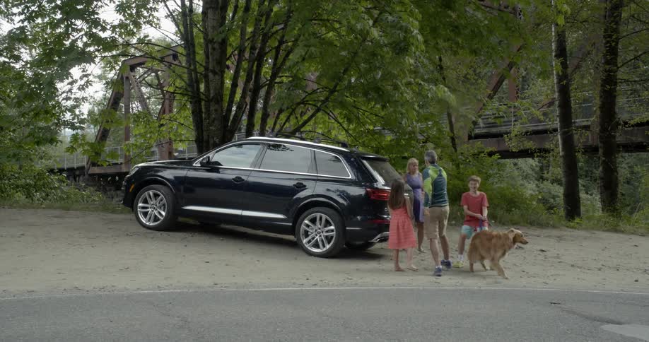 A family getting out of a car