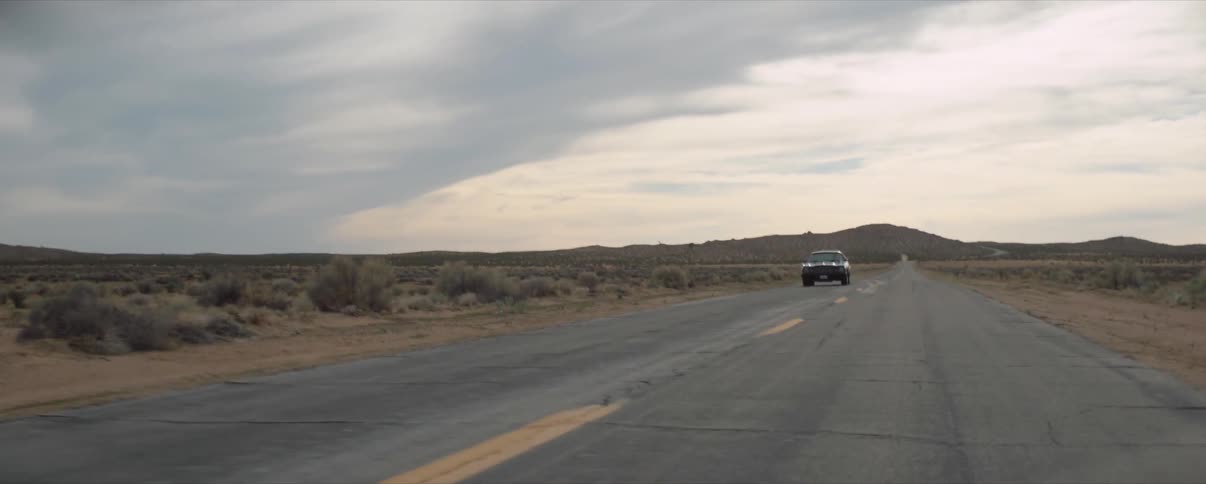Classic Muscle Car In Desert flyby