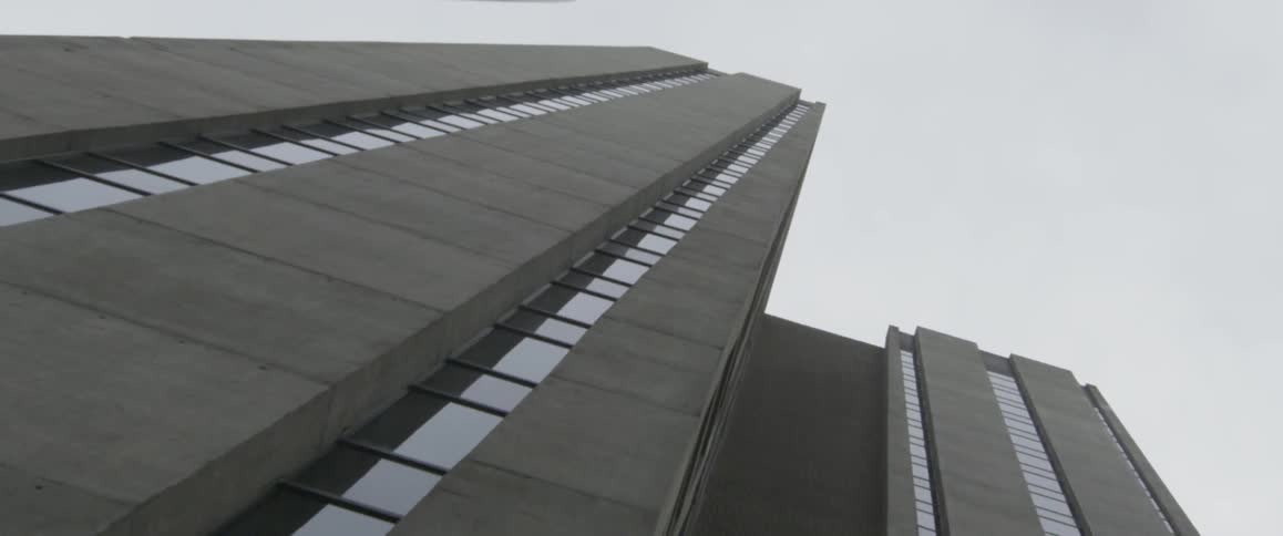 The tall tower is lined with many windows