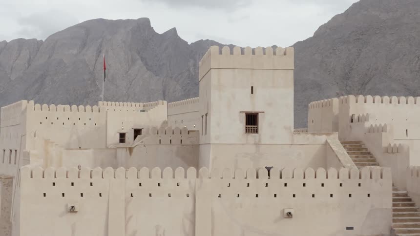 The castle sits by the mountain