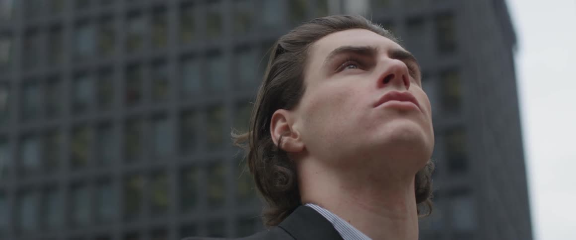 Man Walking Around City