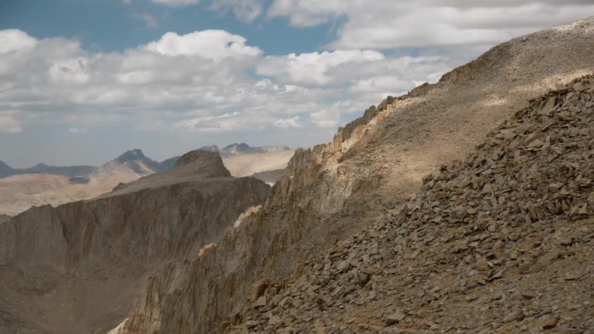 A wild desert cliff is shown
