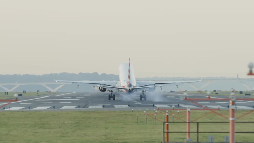 Jet lands on the airport runway