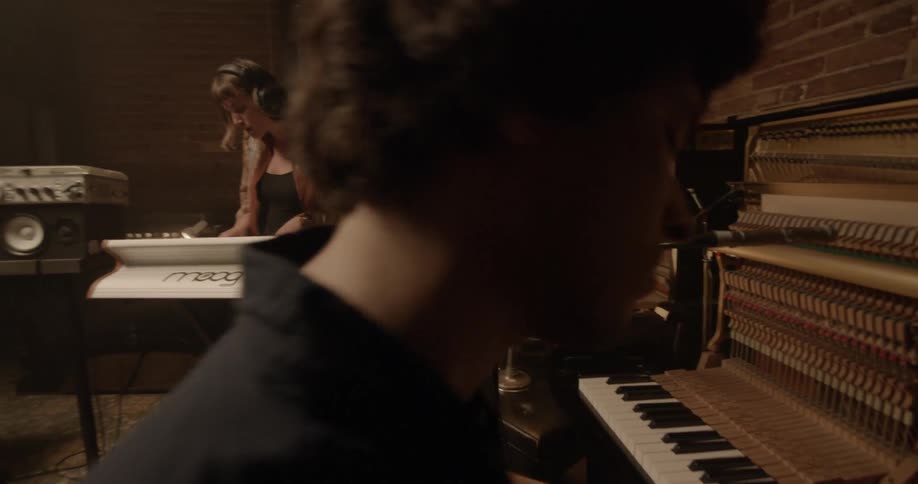 People Playing Music In Studio