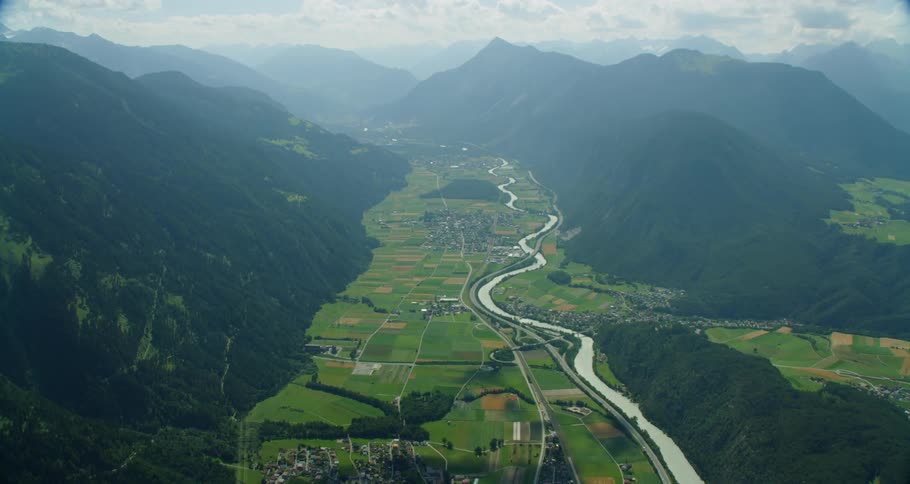 Passing slowly above the valley and villages