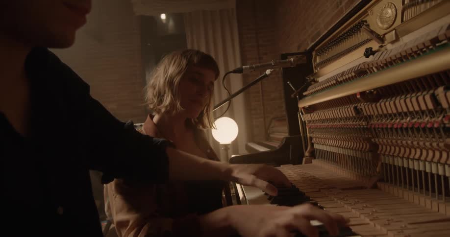 People Playing Music In Studio