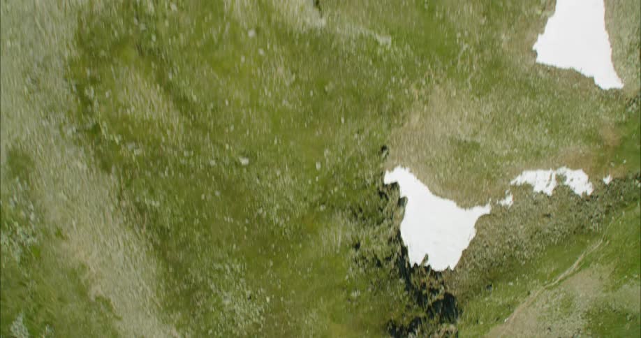 The hills are covered in green grass