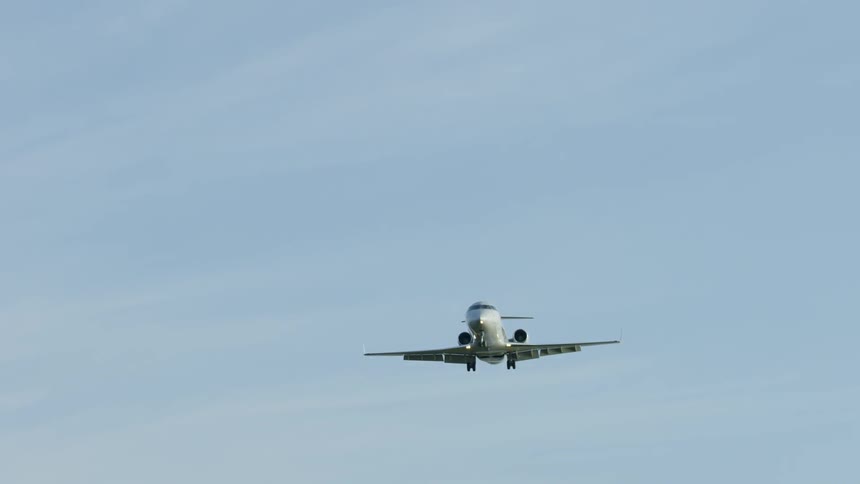 Large airplane flying in a clear sky