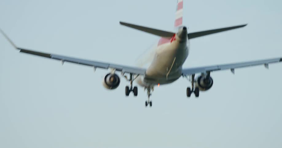 A large airplane increasing altitude