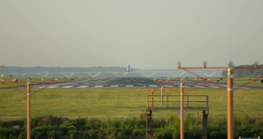 A plane is taking off on the runway