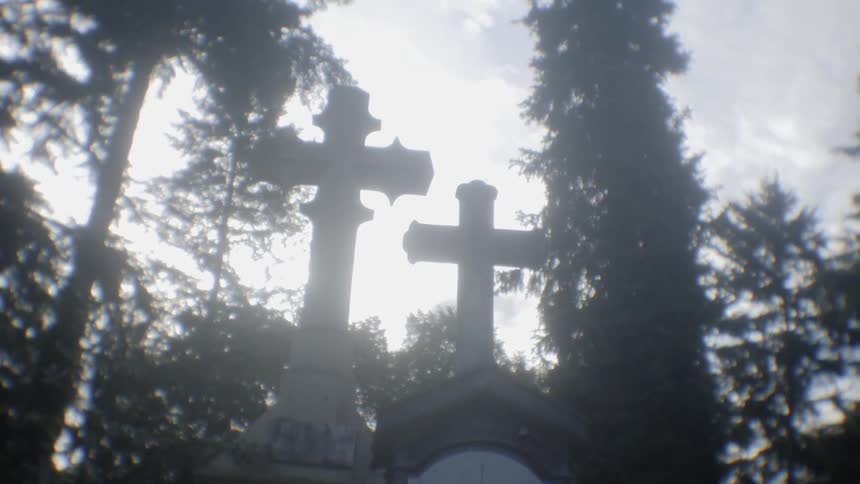 The cemetery has many cross gravestones