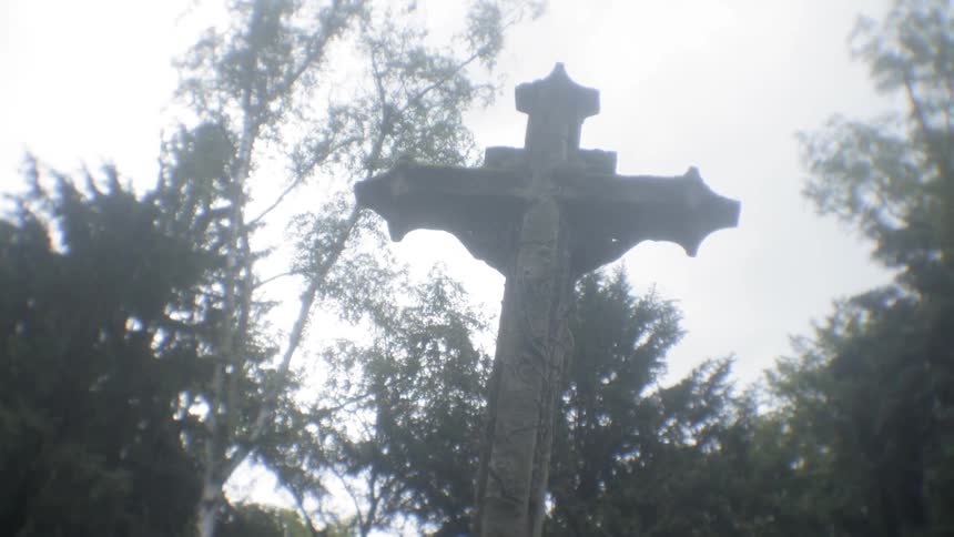 Back view of statue of jesus on the cross