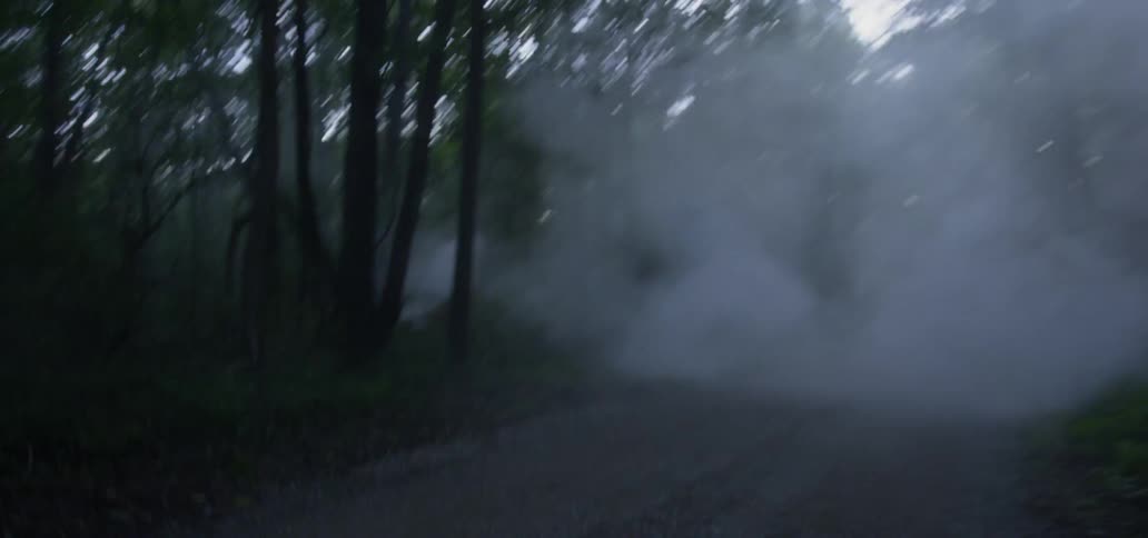 Vintage VW Bug Car Driving Down Gravel Road