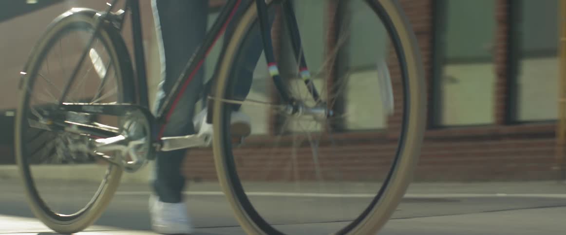 A person walking with a bike