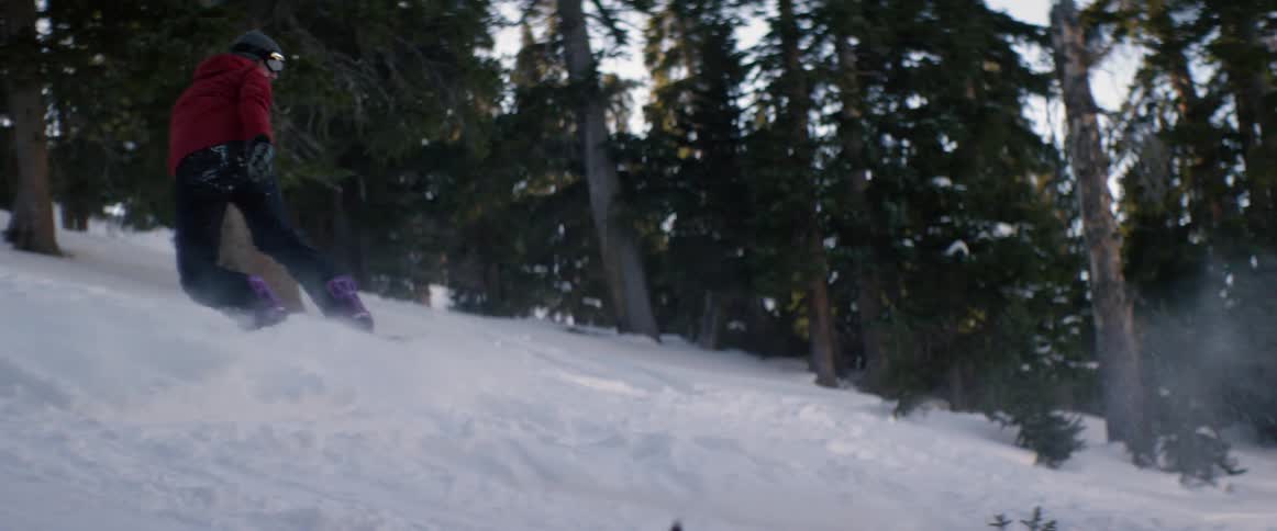 People are snowboarding