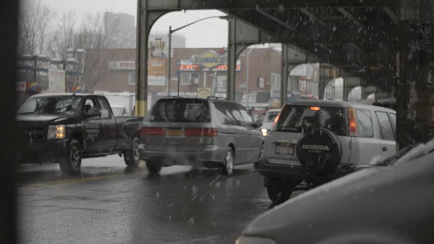 A busy city scenery at rainy day