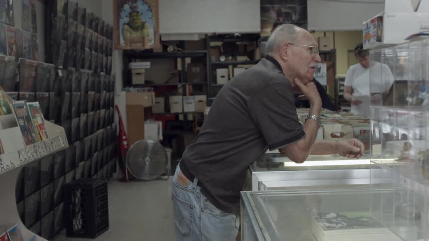 A man is thinking in a store