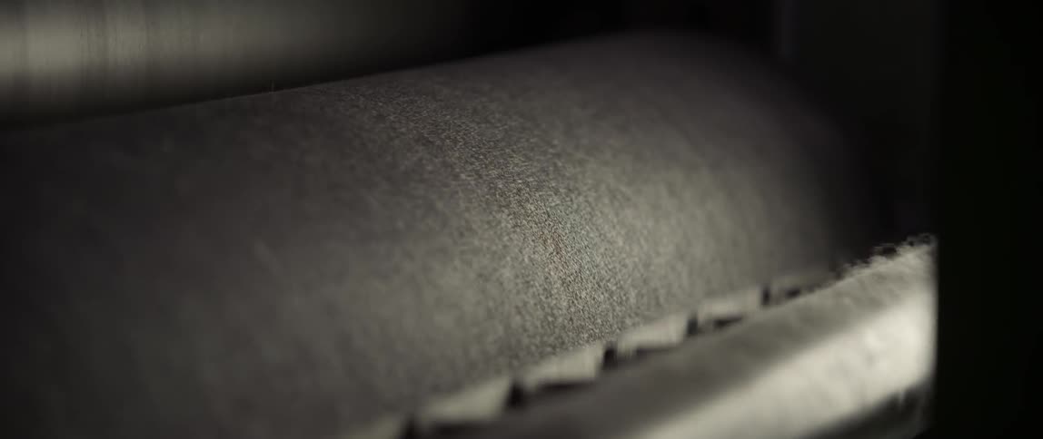 A machine rolling a fabric