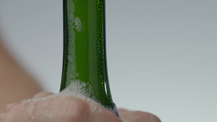 Bubbles running down a bottle