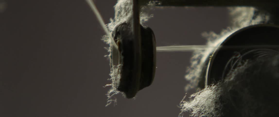 Wool is being spun in a machine