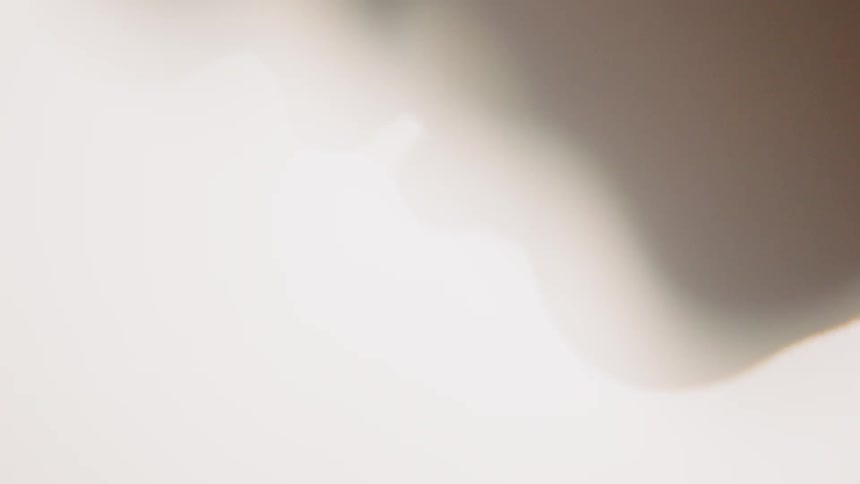 Light shines on a person's mouth and chin
