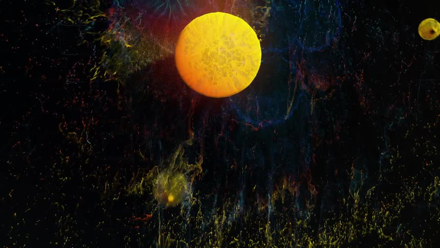 Yellow bubbles exploding in colors