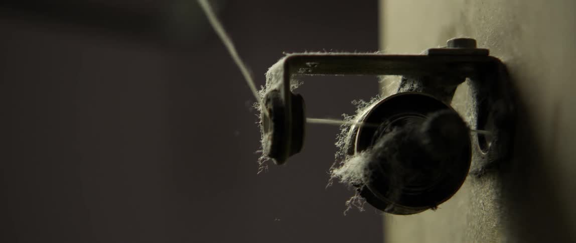A string being pulled through a hole