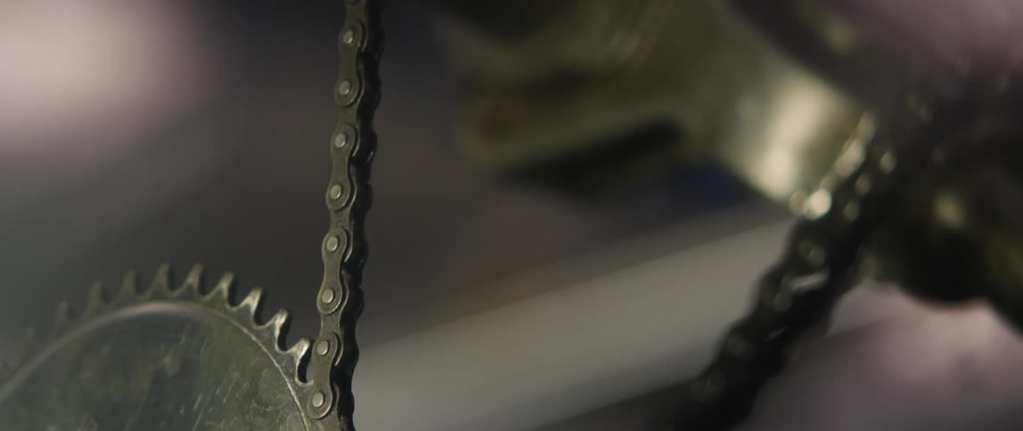 Bike chain rotates slowly on a wheel