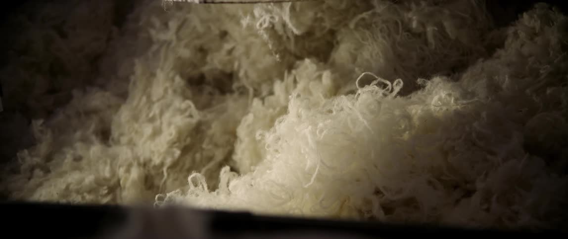 Fur is being cut and put in piles