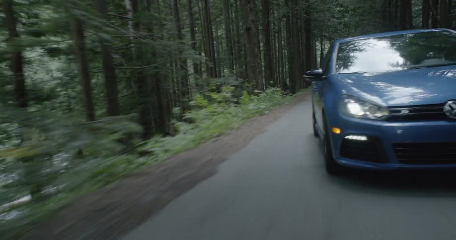 Car Driving On Forest Roads