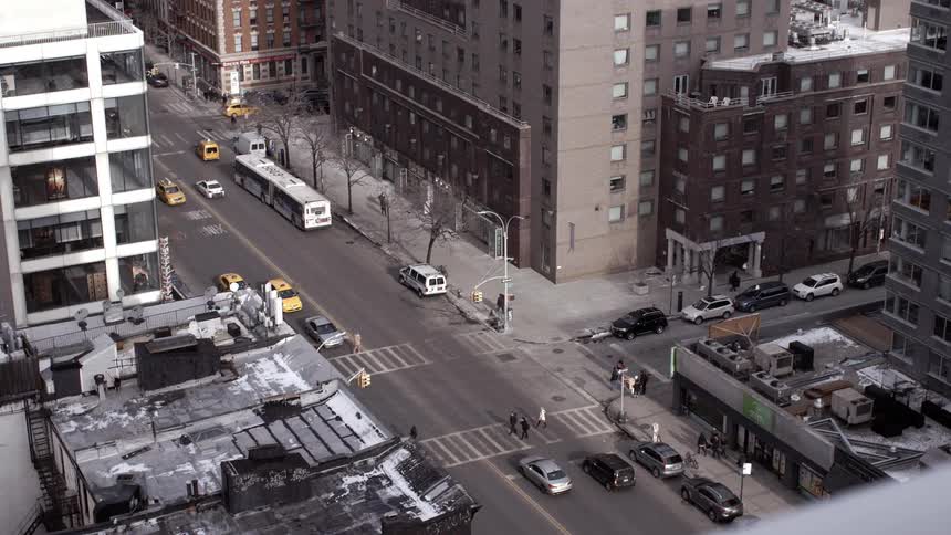 Cars are going down the street