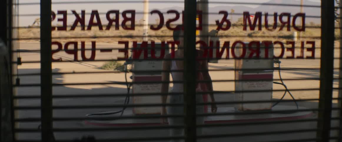 A woman runs into the restaurant covered in blood
