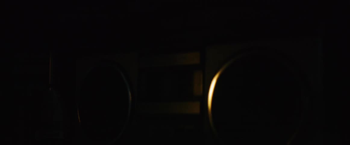 The radio is shaking in the dark