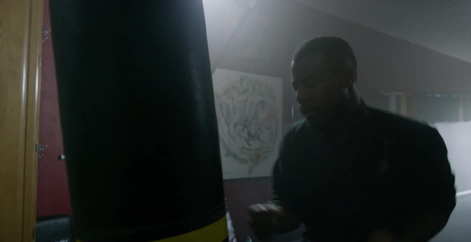 A man punching a bag
