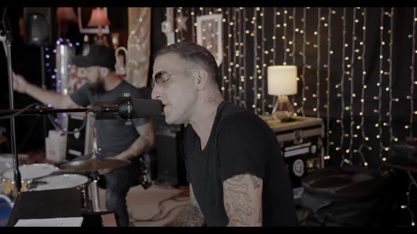 Men playing music in a studio