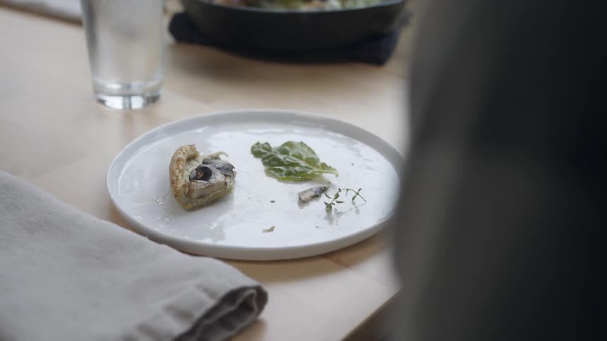 A person is having a meal at home