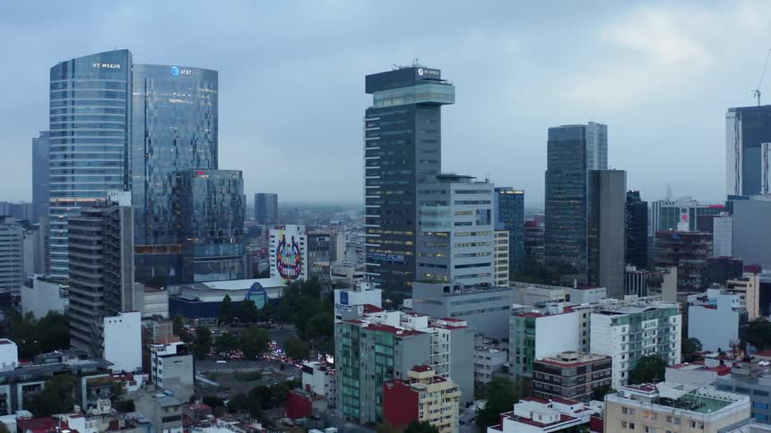 The clouds are above the skyline