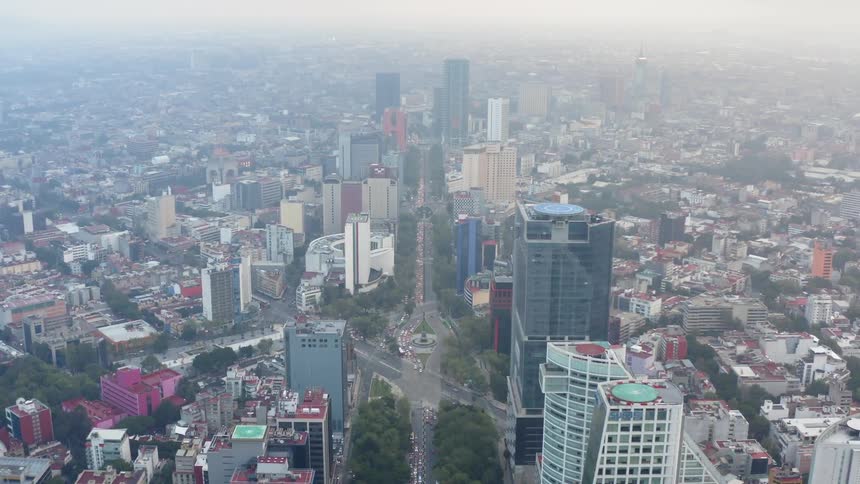 A city is filled with many skyscrapers and buildings
