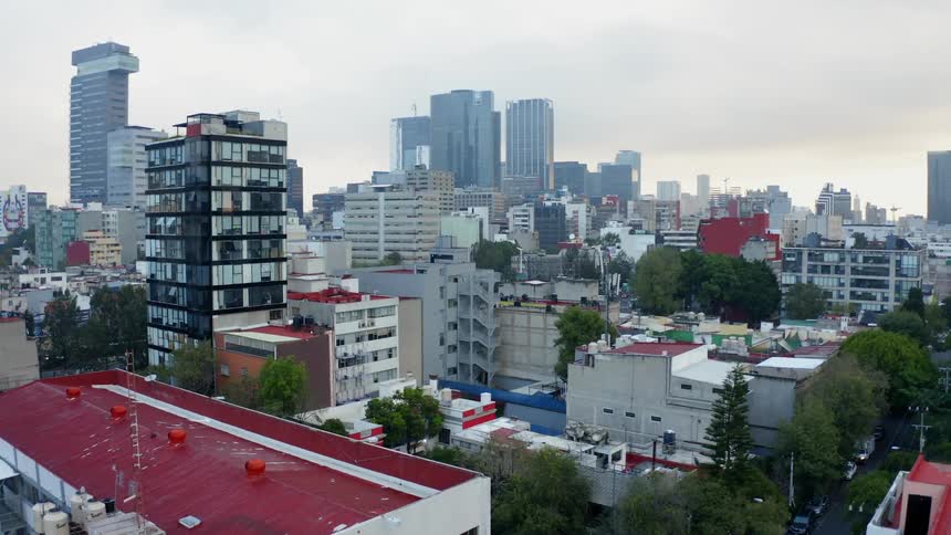 A city with many buildings and trees
