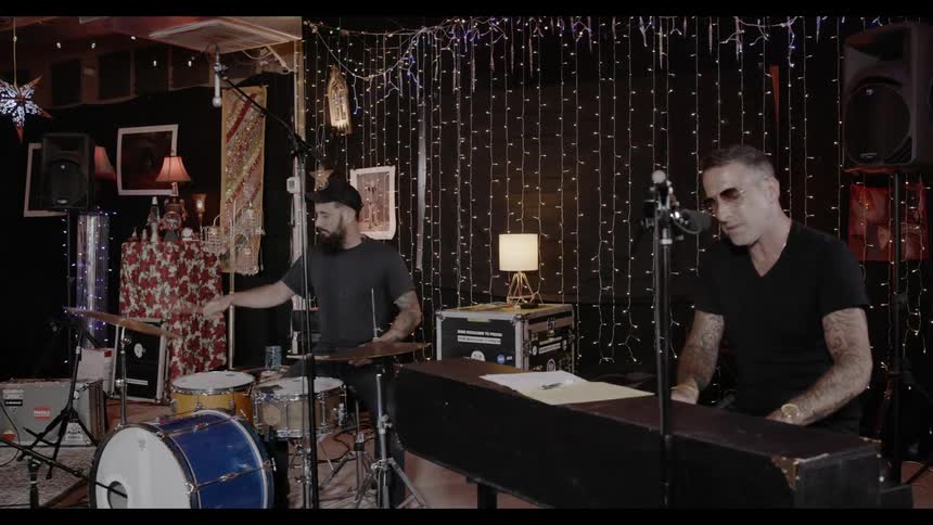 A band plays in a music room
