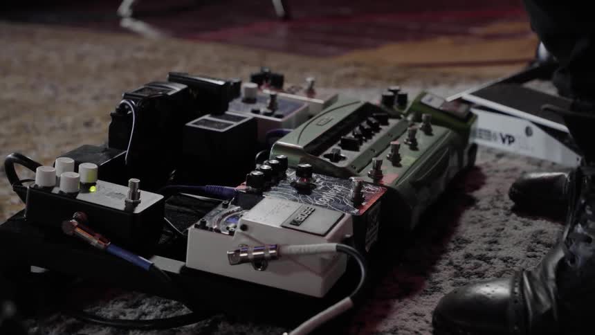 Musician tapping pedalboard