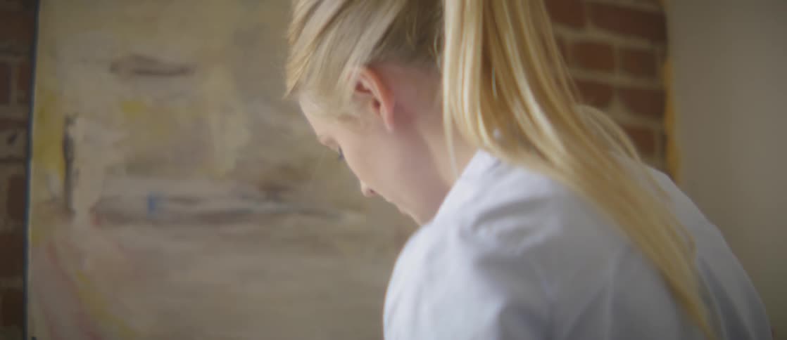 Girl Painting In Art Studio