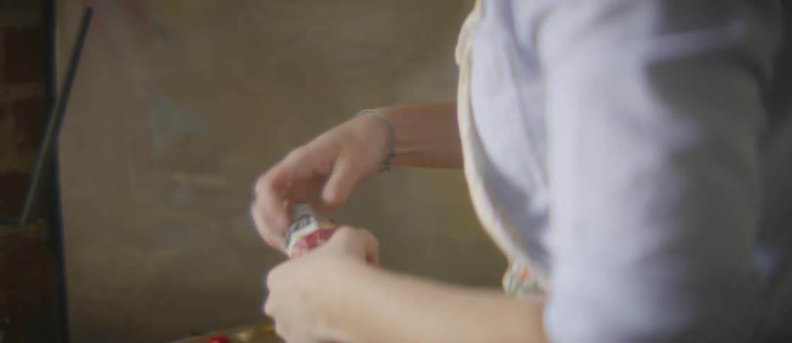 A woman preparing to paint