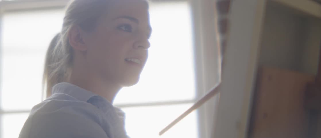 Girl Painting In Art Studio