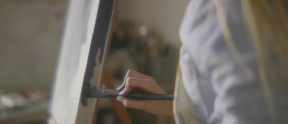 Girl Painting In Art Studio