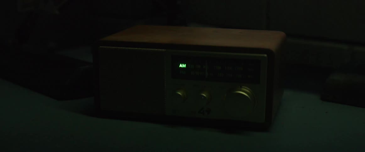 Light flashes on and off showing old-school style alarm clock