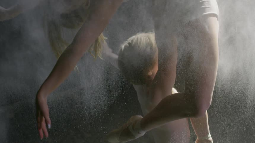 Multiple woman holding an acrobatic pose